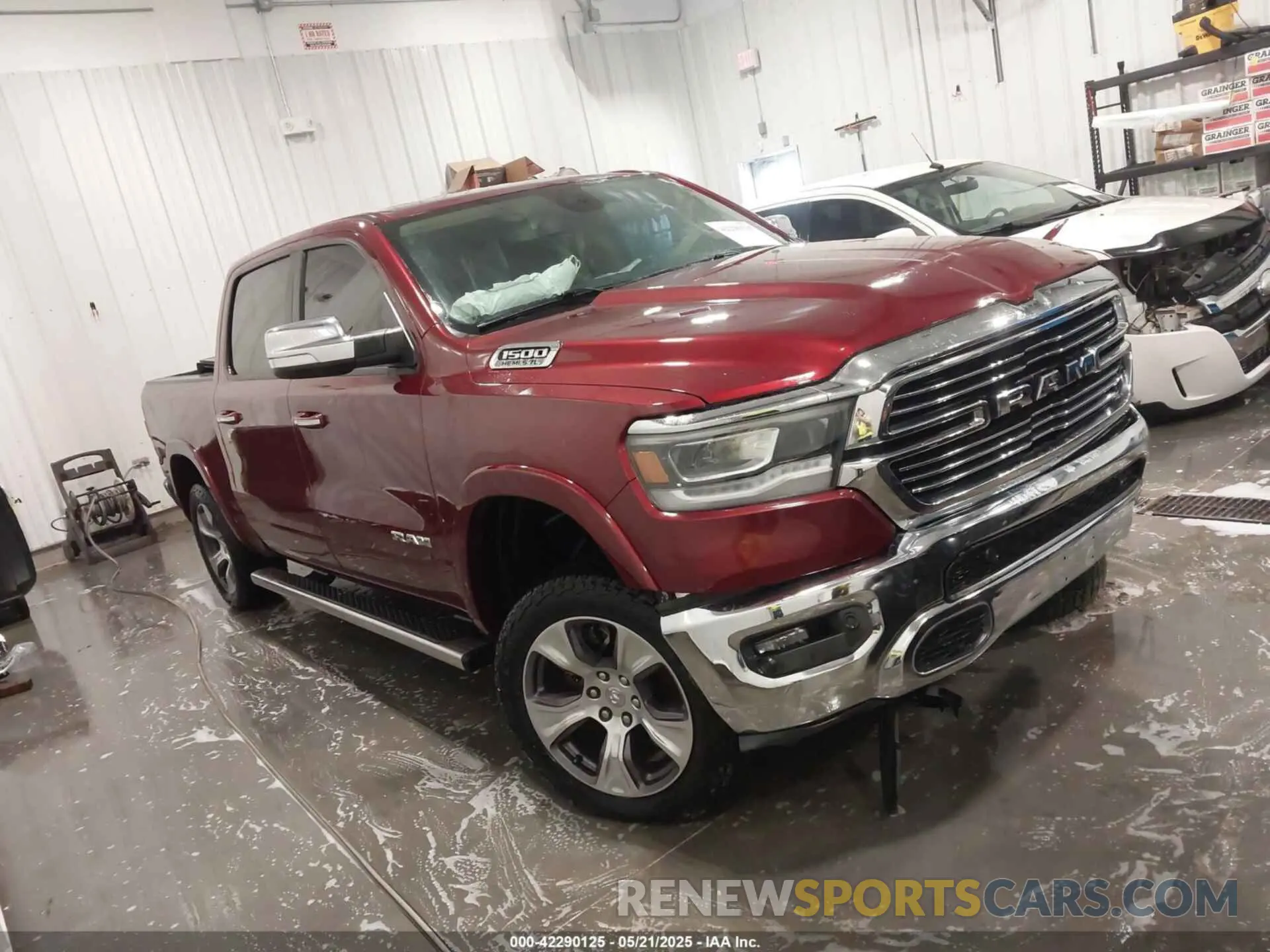 1 Photograph of a damaged car 1C6SRFJT5LN109384 RAM 1500 2020