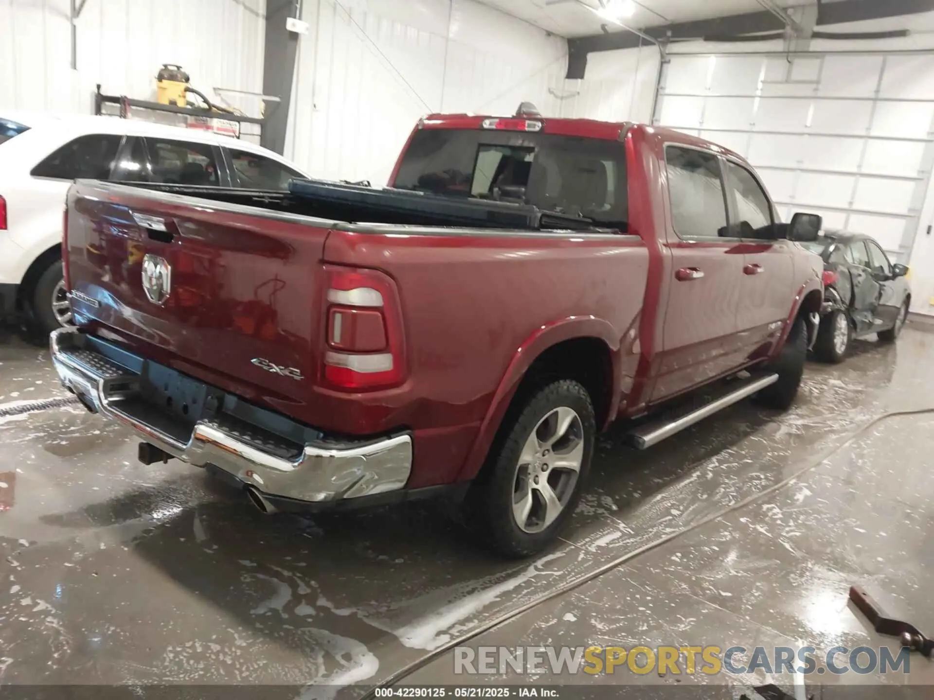 4 Photograph of a damaged car 1C6SRFJT5LN109384 RAM 1500 2020