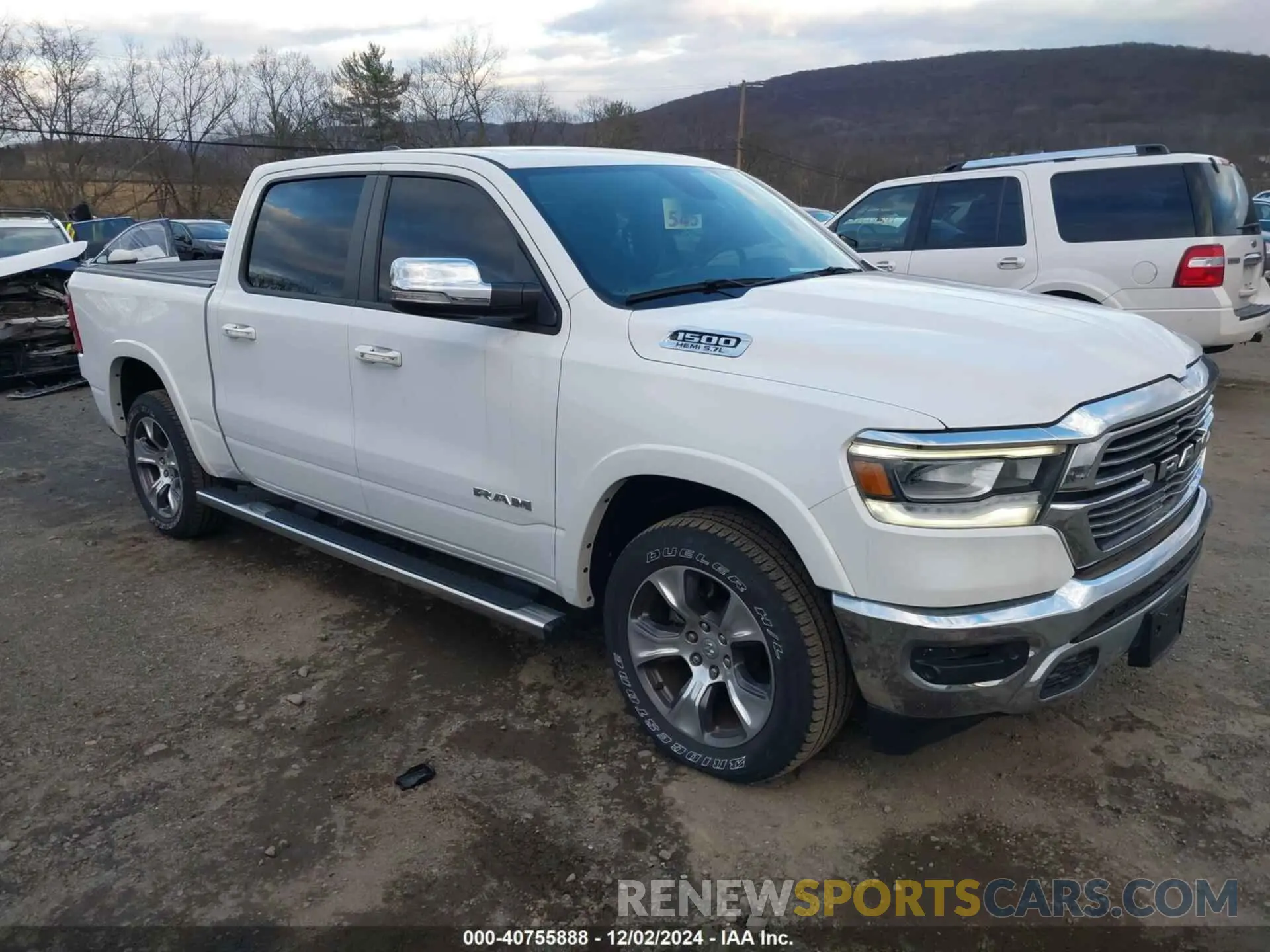 1 Photograph of a damaged car 1C6SRFJT5LN220243 RAM 1500 2020