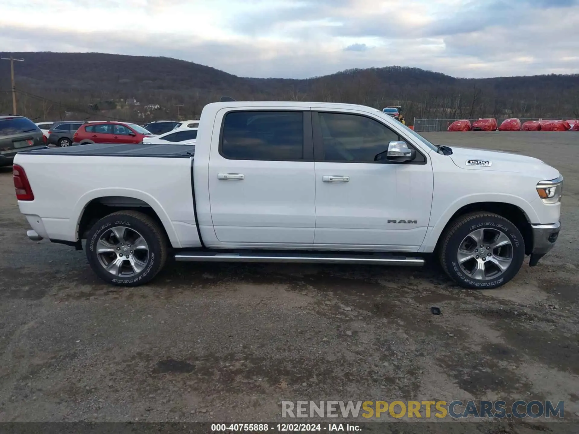 14 Photograph of a damaged car 1C6SRFJT5LN220243 RAM 1500 2020