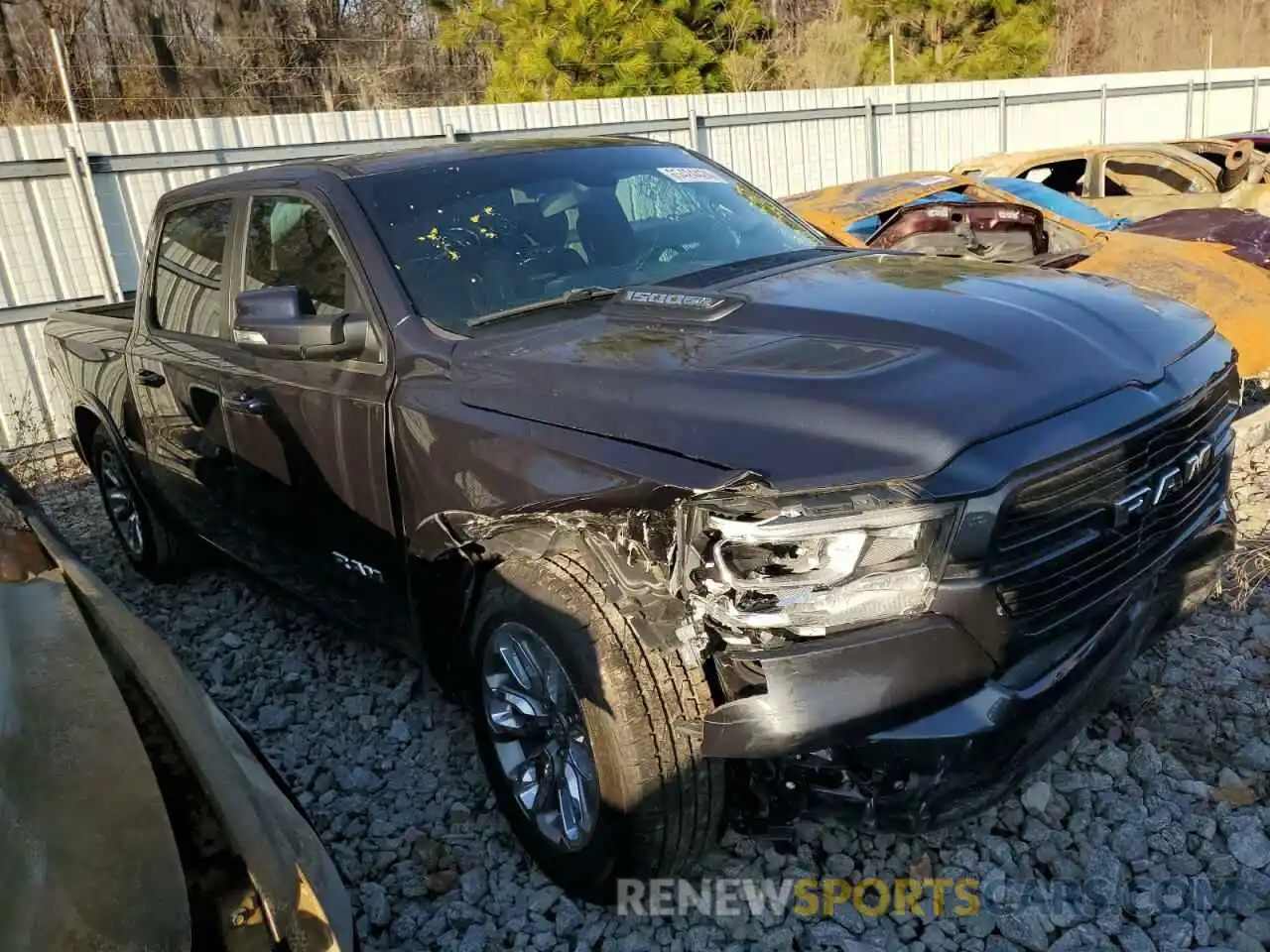 4 Photograph of a damaged car 1C6SRFJT5LN335778 RAM 1500 2020