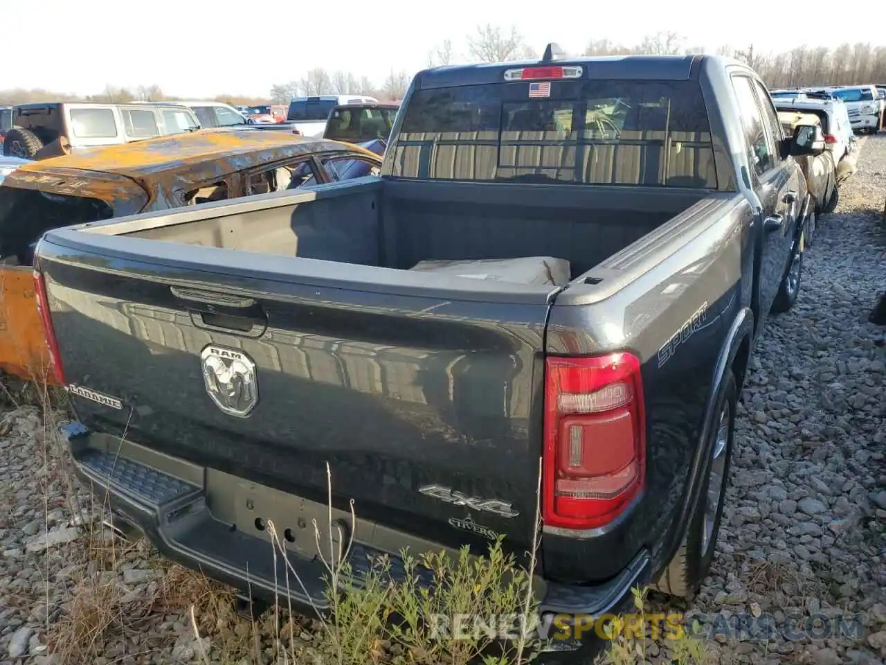 6 Photograph of a damaged car 1C6SRFJT5LN335778 RAM 1500 2020