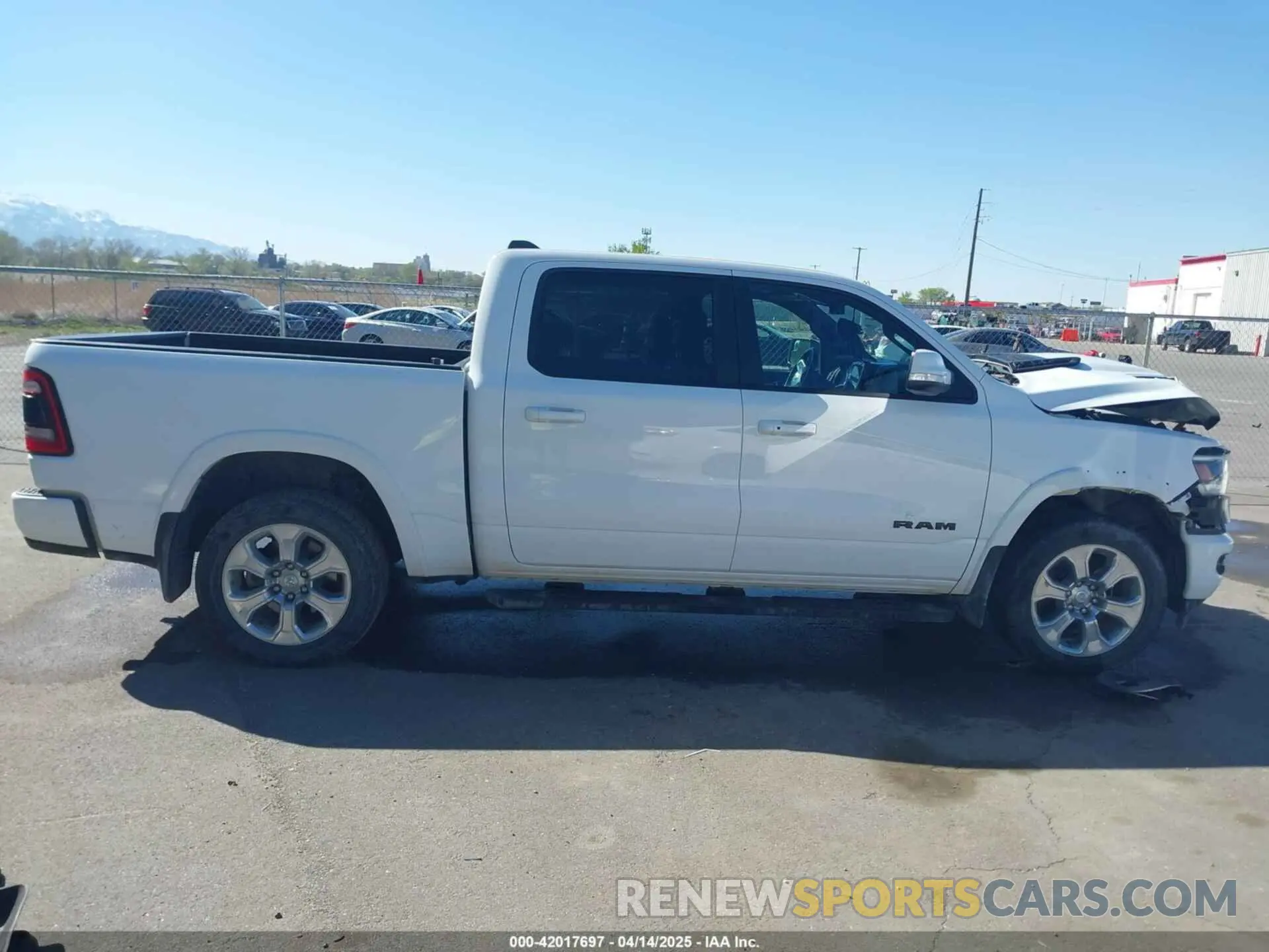 14 Photograph of a damaged car 1C6SRFJT6LN116859 RAM 1500 2020