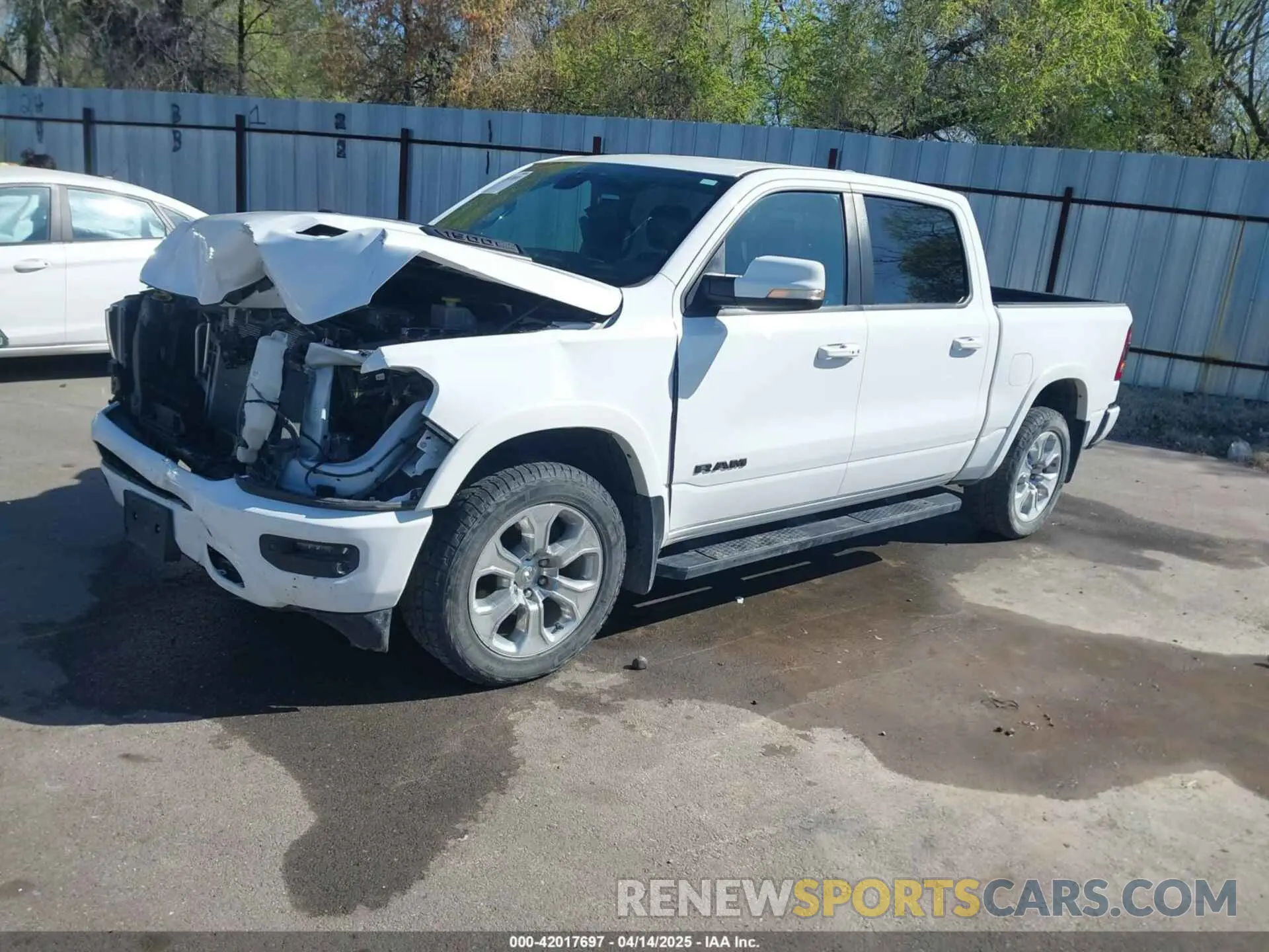 2 Photograph of a damaged car 1C6SRFJT6LN116859 RAM 1500 2020