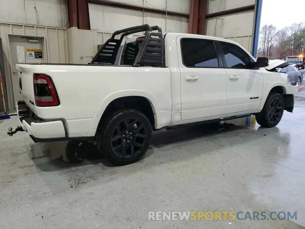 3 Photograph of a damaged car 1C6SRFJT6LN148839 RAM 1500 2020