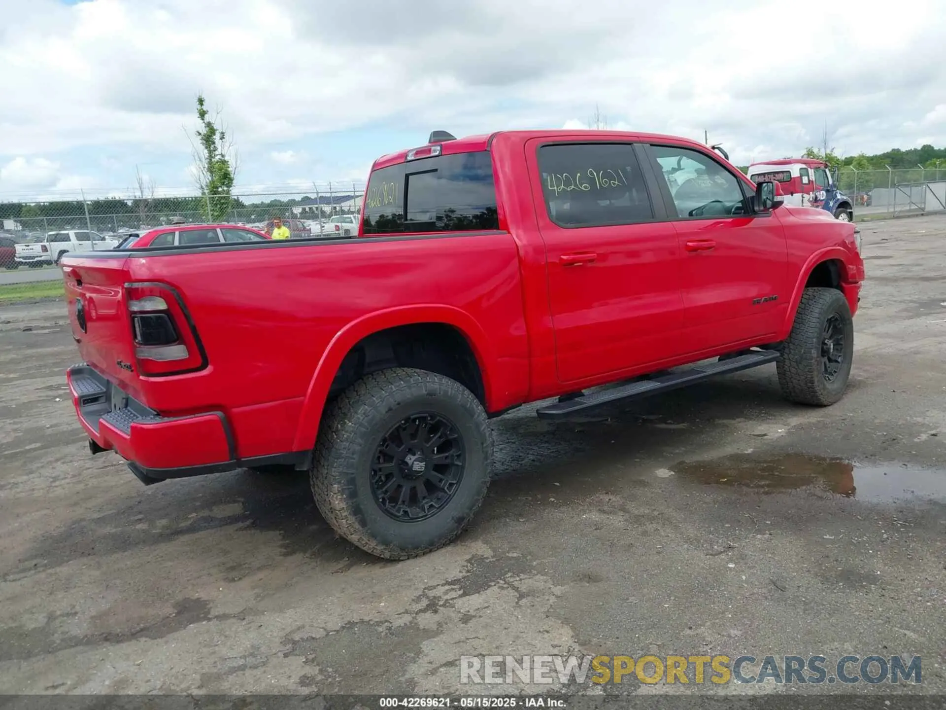 4 Photograph of a damaged car 1C6SRFJT6LN183087 RAM 1500 2020