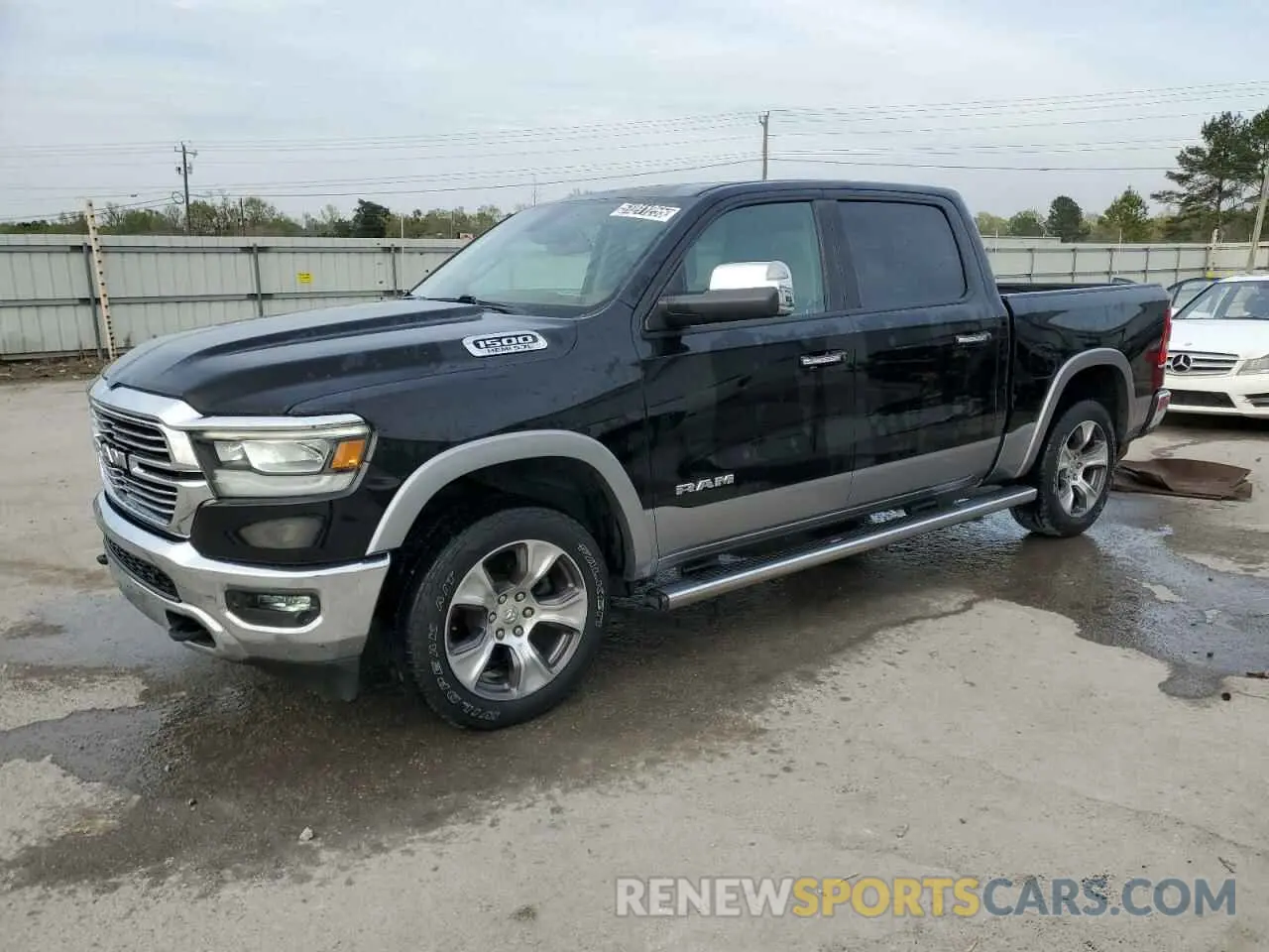 1 Photograph of a damaged car 1C6SRFJT6LN208067 RAM 1500 2020
