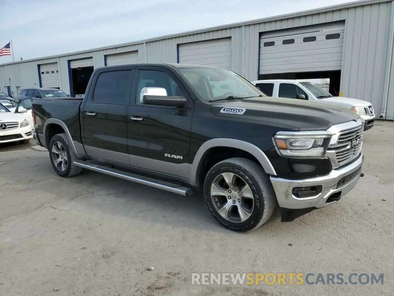 4 Photograph of a damaged car 1C6SRFJT6LN208067 RAM 1500 2020