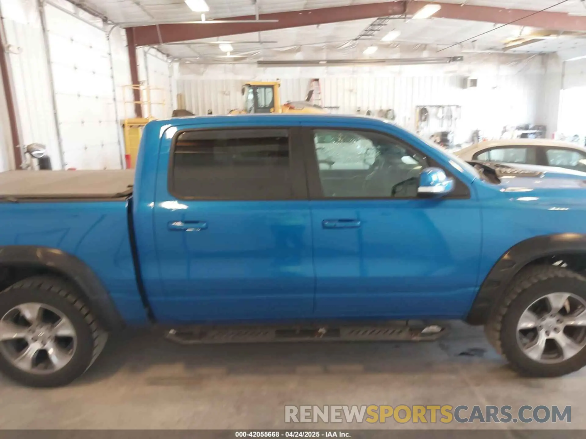 13 Photograph of a damaged car 1C6SRFJT6LN339838 RAM 1500 2020