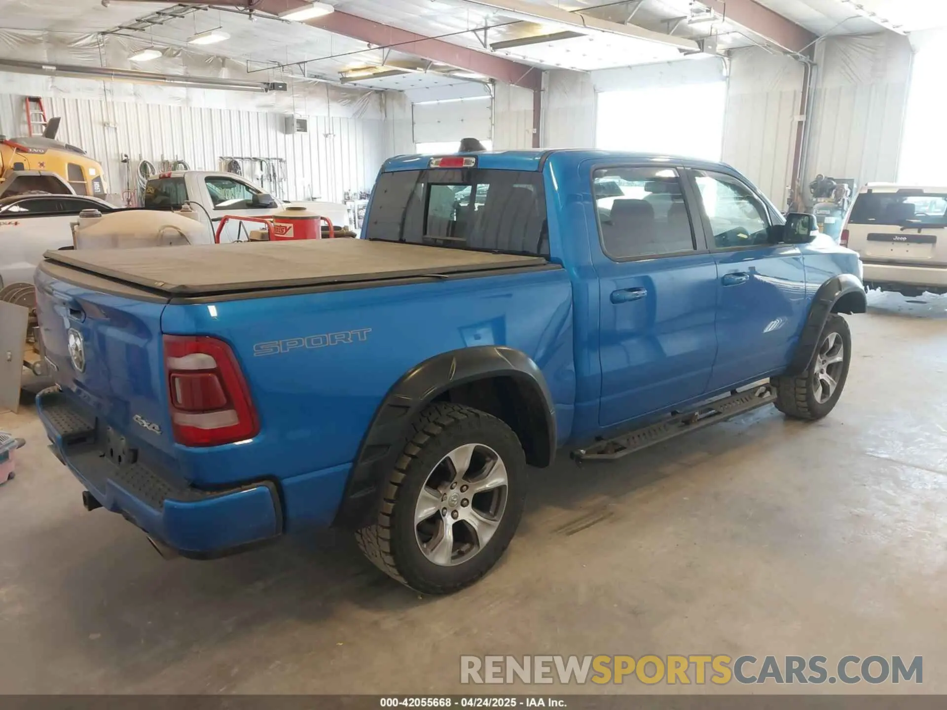 4 Photograph of a damaged car 1C6SRFJT6LN339838 RAM 1500 2020