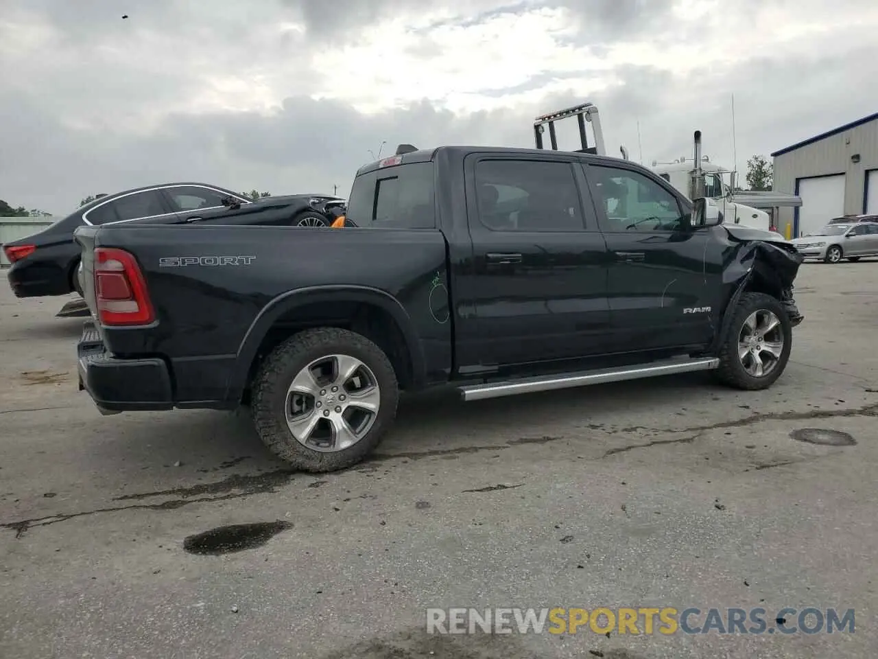 3 Photograph of a damaged car 1C6SRFJT6LN367834 RAM 1500 2020