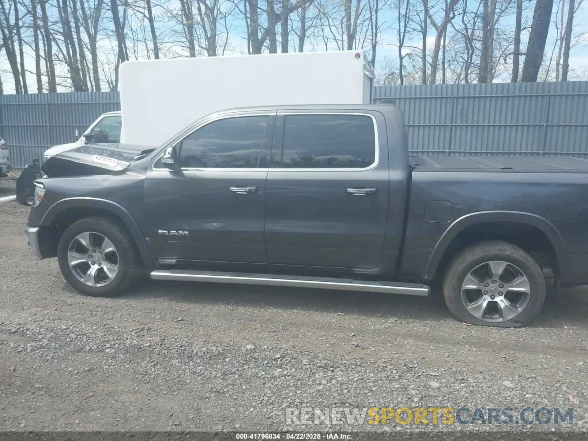 14 Photograph of a damaged car 1C6SRFJT8LN243564 RAM 1500 2020