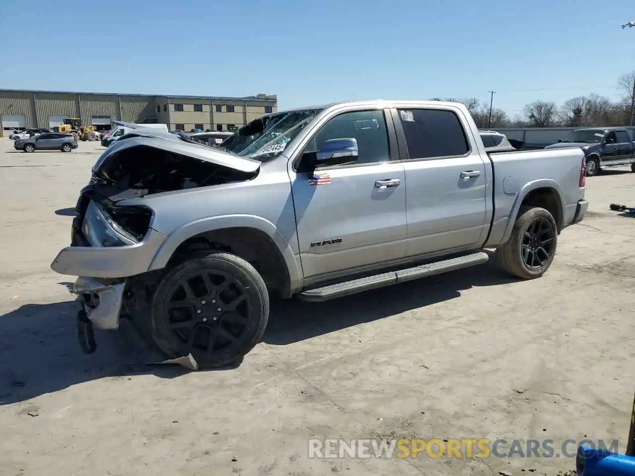 1 Photograph of a damaged car 1C6SRFJT8LN308610 RAM 1500 2020