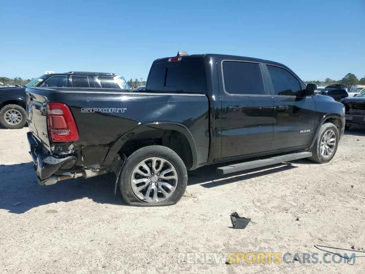 3 Photograph of a damaged car 1C6SRFJT9LN157101 RAM 1500 2020