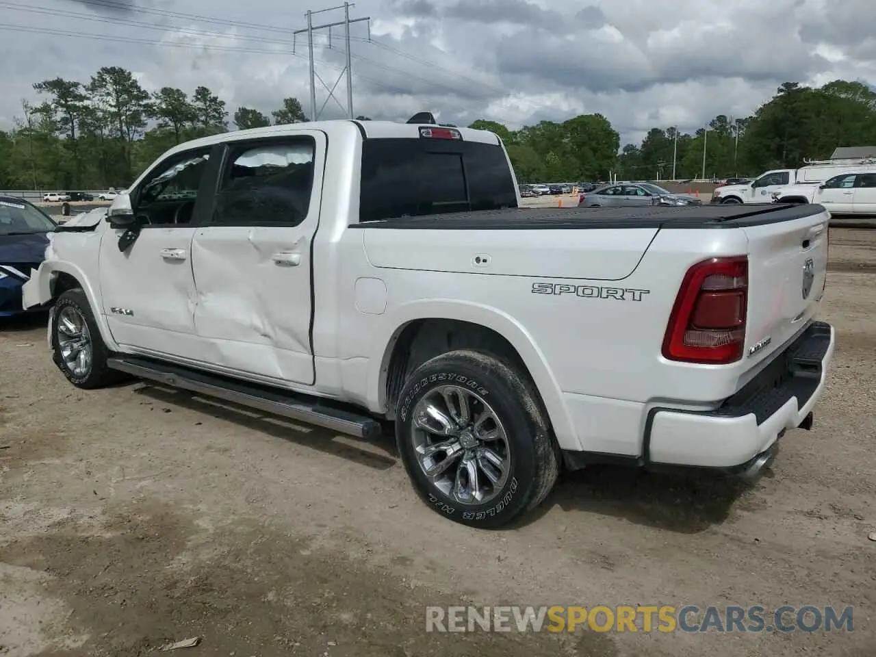 2 Photograph of a damaged car 1C6SRFJT9LN391058 RAM 1500 2020