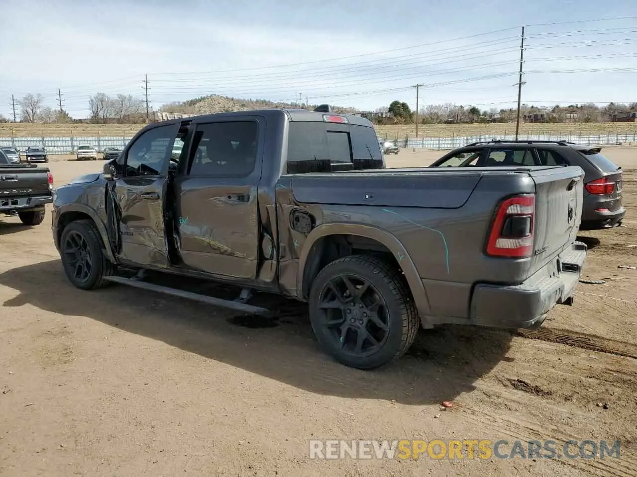 2 Photograph of a damaged car 1C6SRFJTXLN111602 RAM 1500 2020