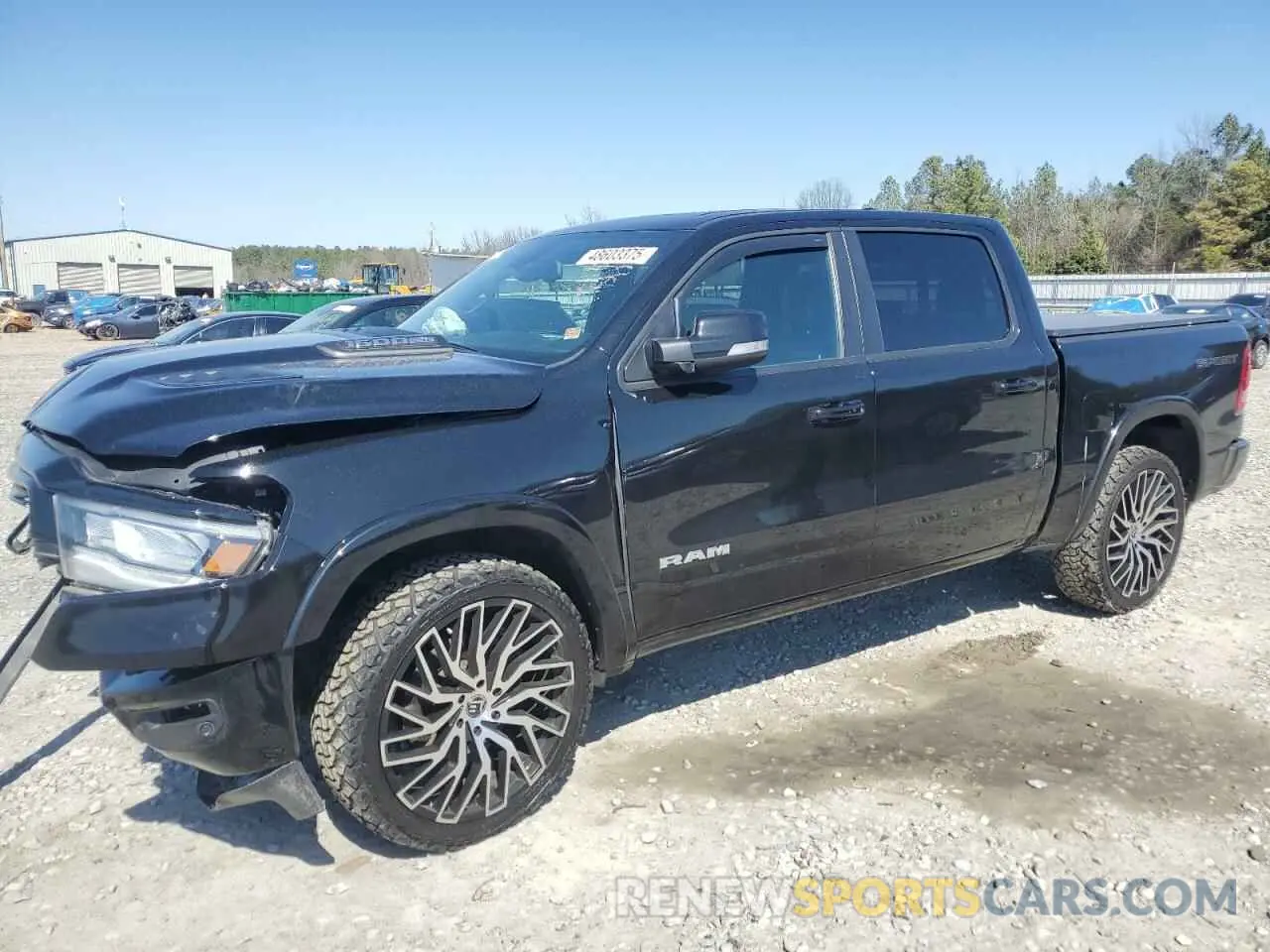 1 Photograph of a damaged car 1C6SRFJTXLN157284 RAM 1500 2020