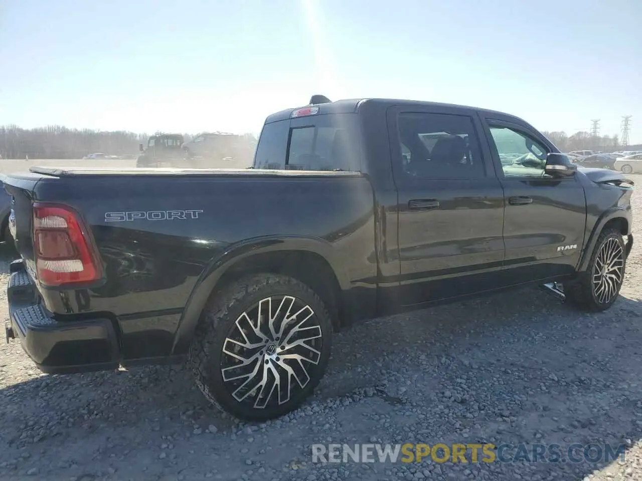 3 Photograph of a damaged car 1C6SRFJTXLN157284 RAM 1500 2020