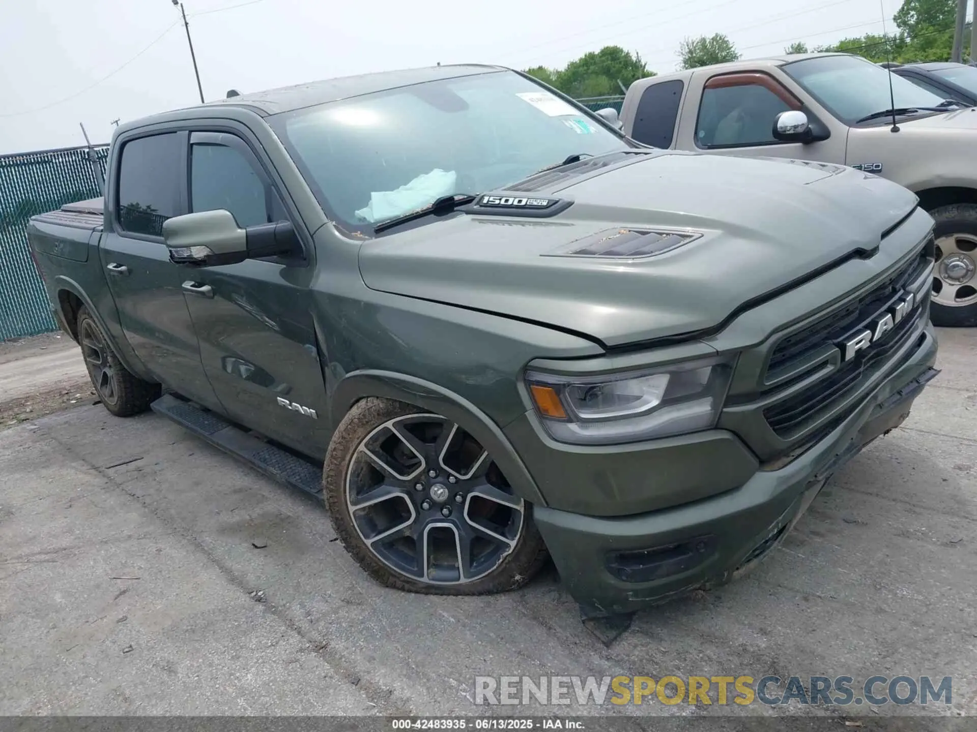 1 Photograph of a damaged car 1C6SRFJTXLN181021 RAM 1500 2020