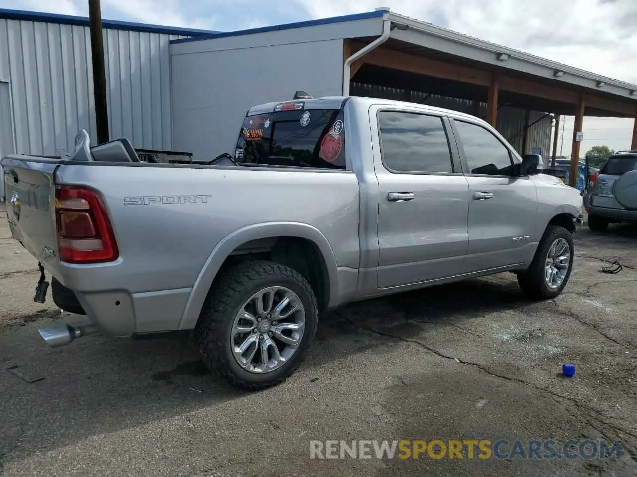 3 Photograph of a damaged car 1C6SRFJTXLN350079 RAM 1500 2020