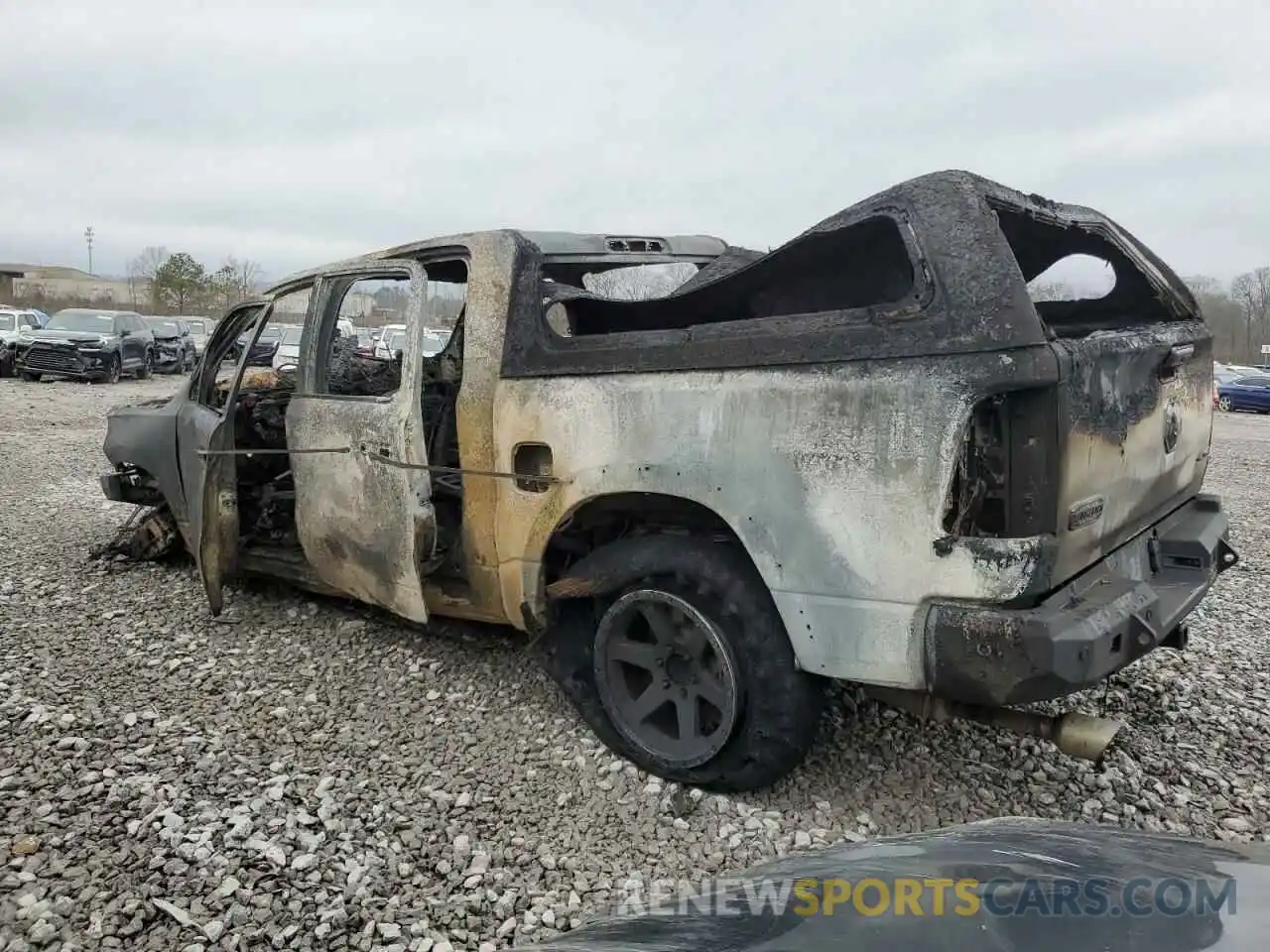 2 Photograph of a damaged car 1C6SRFKM2LN201396 RAM 1500 2020