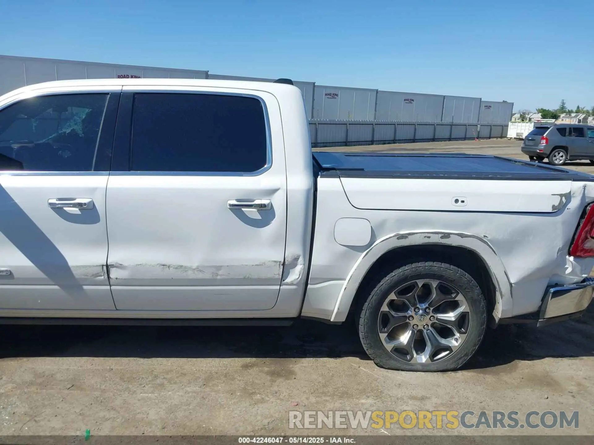 6 Photograph of a damaged car 1C6SRFKM9LN229373 RAM 1500 2020