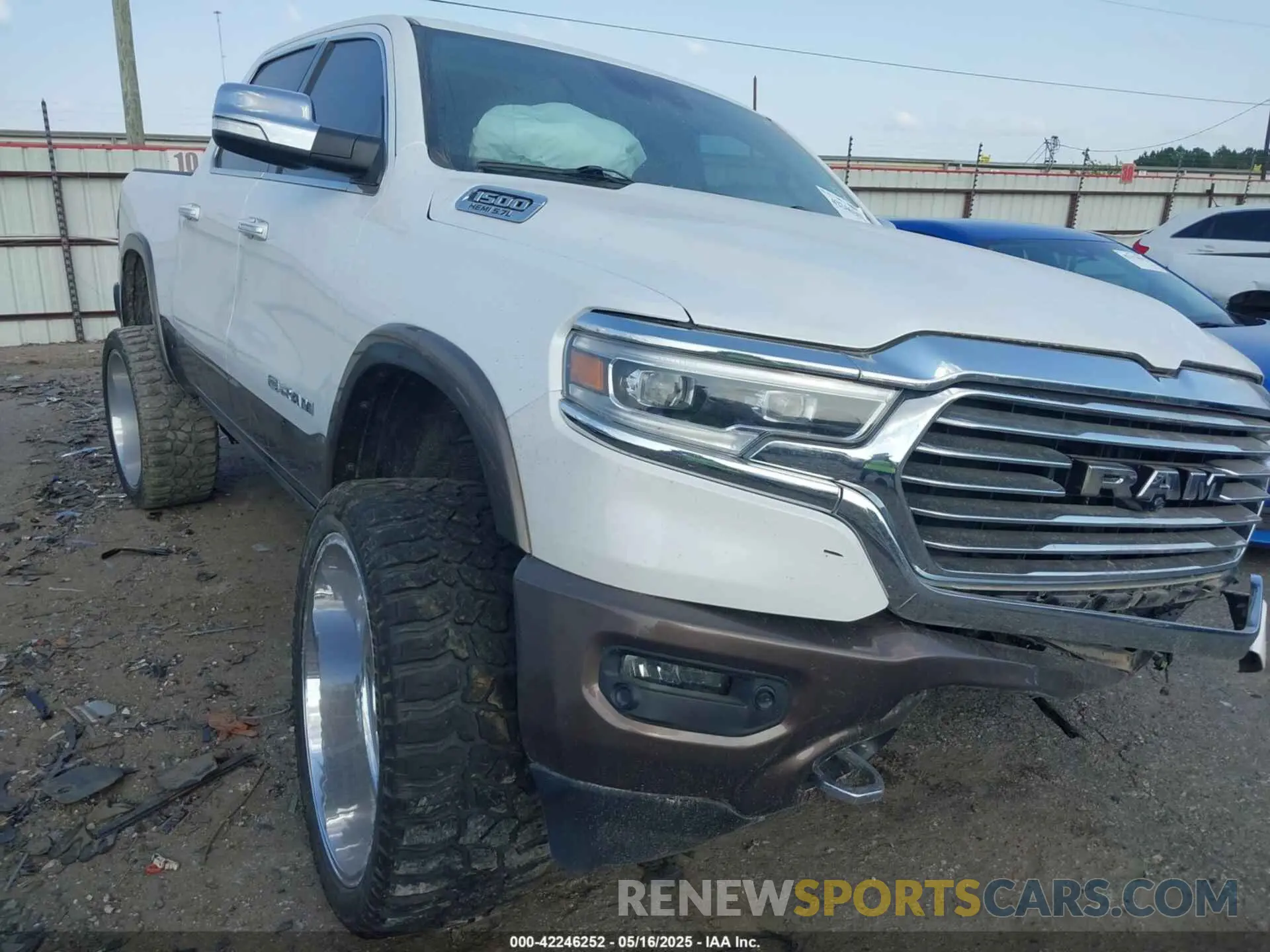 1 Photograph of a damaged car 1C6SRFKT0LN127449 RAM 1500 2020