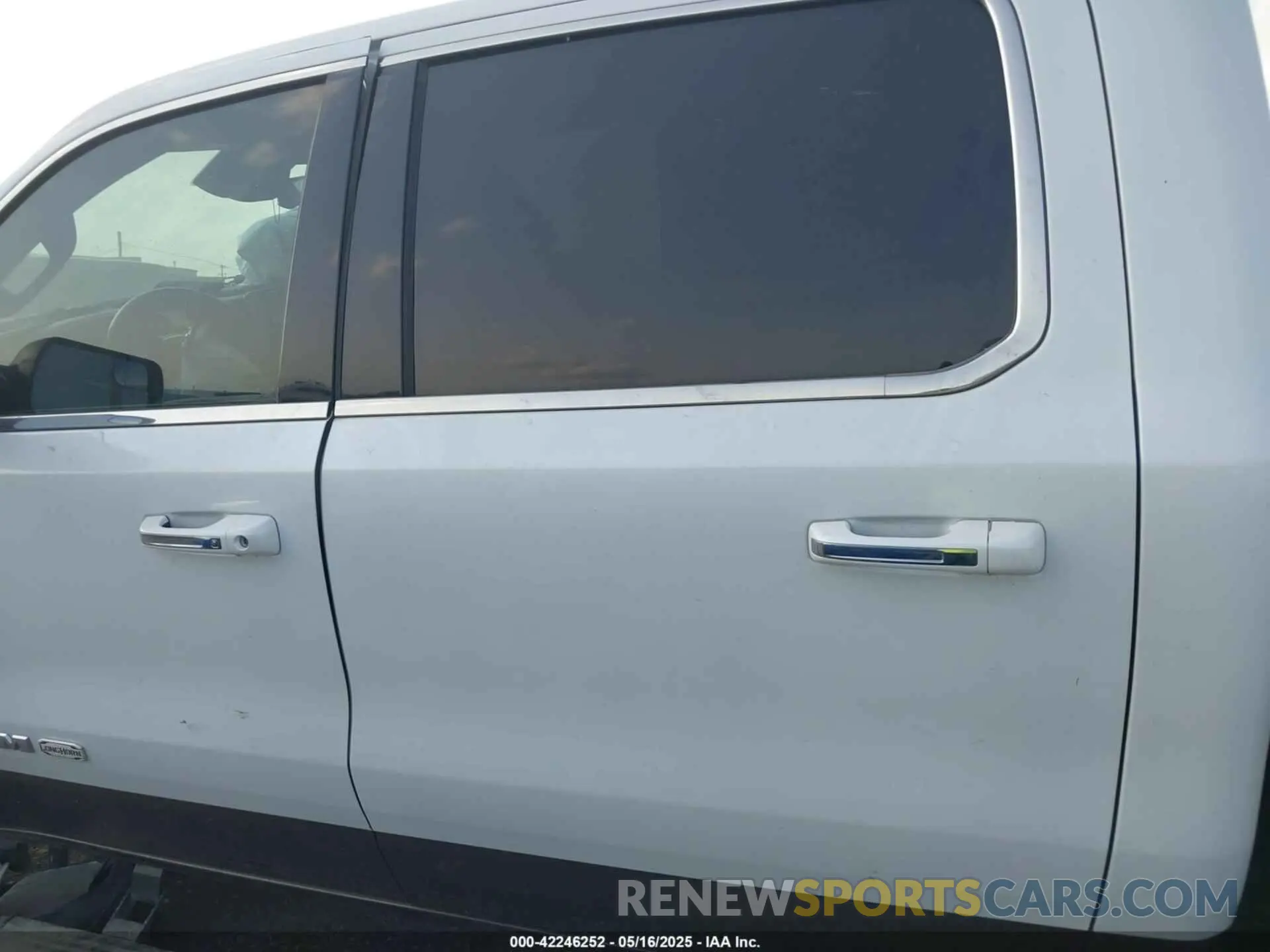 14 Photograph of a damaged car 1C6SRFKT0LN127449 RAM 1500 2020