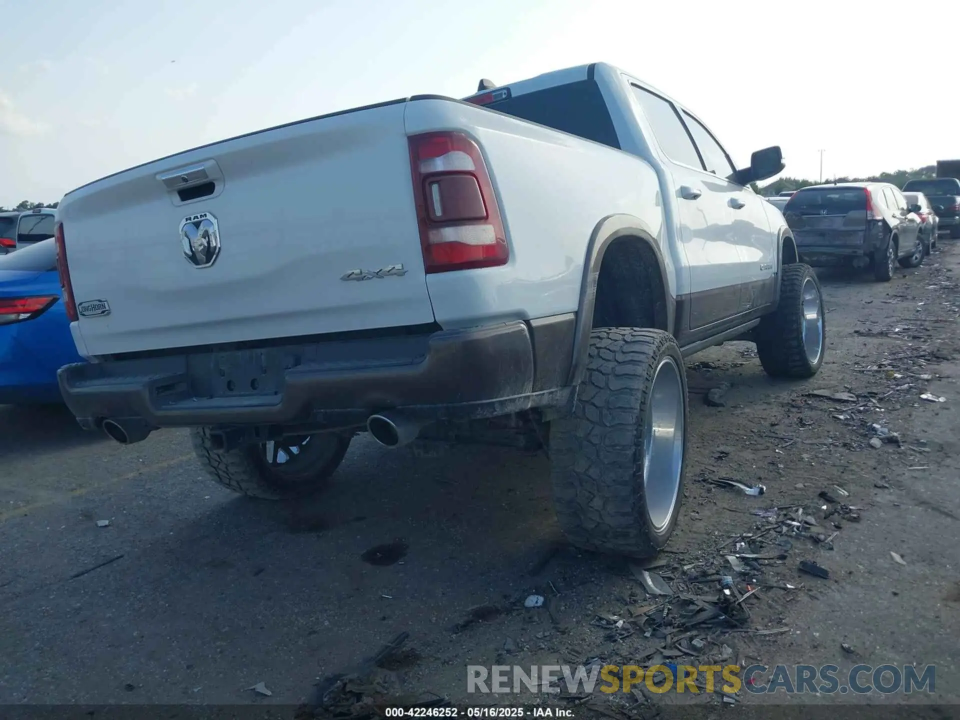 4 Photograph of a damaged car 1C6SRFKT0LN127449 RAM 1500 2020