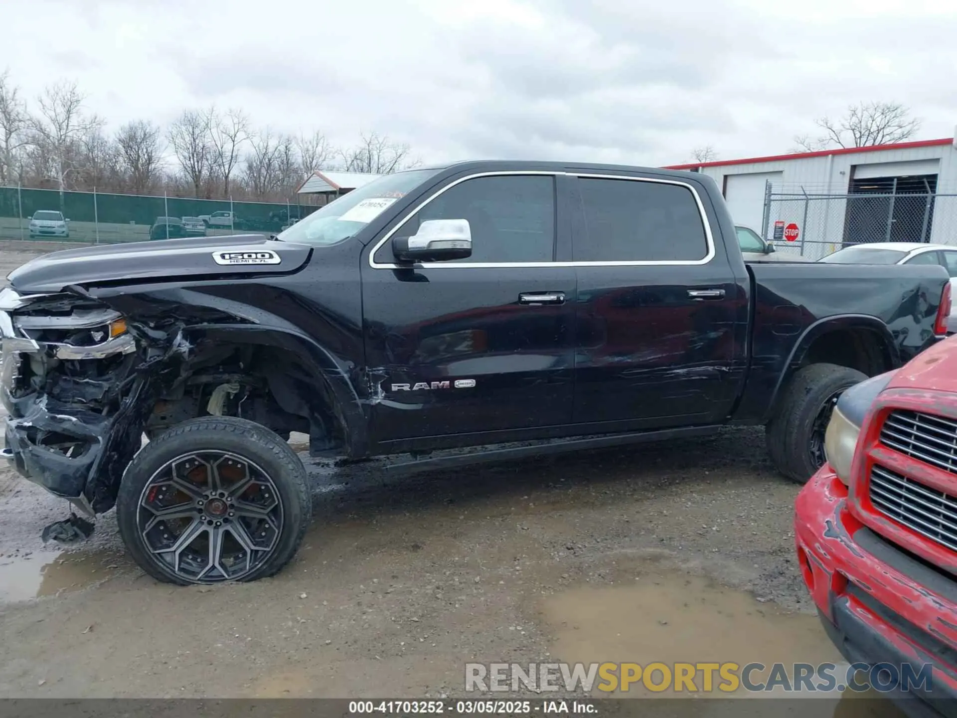 14 Photograph of a damaged car 1C6SRFKT8LN234913 RAM 1500 2020
