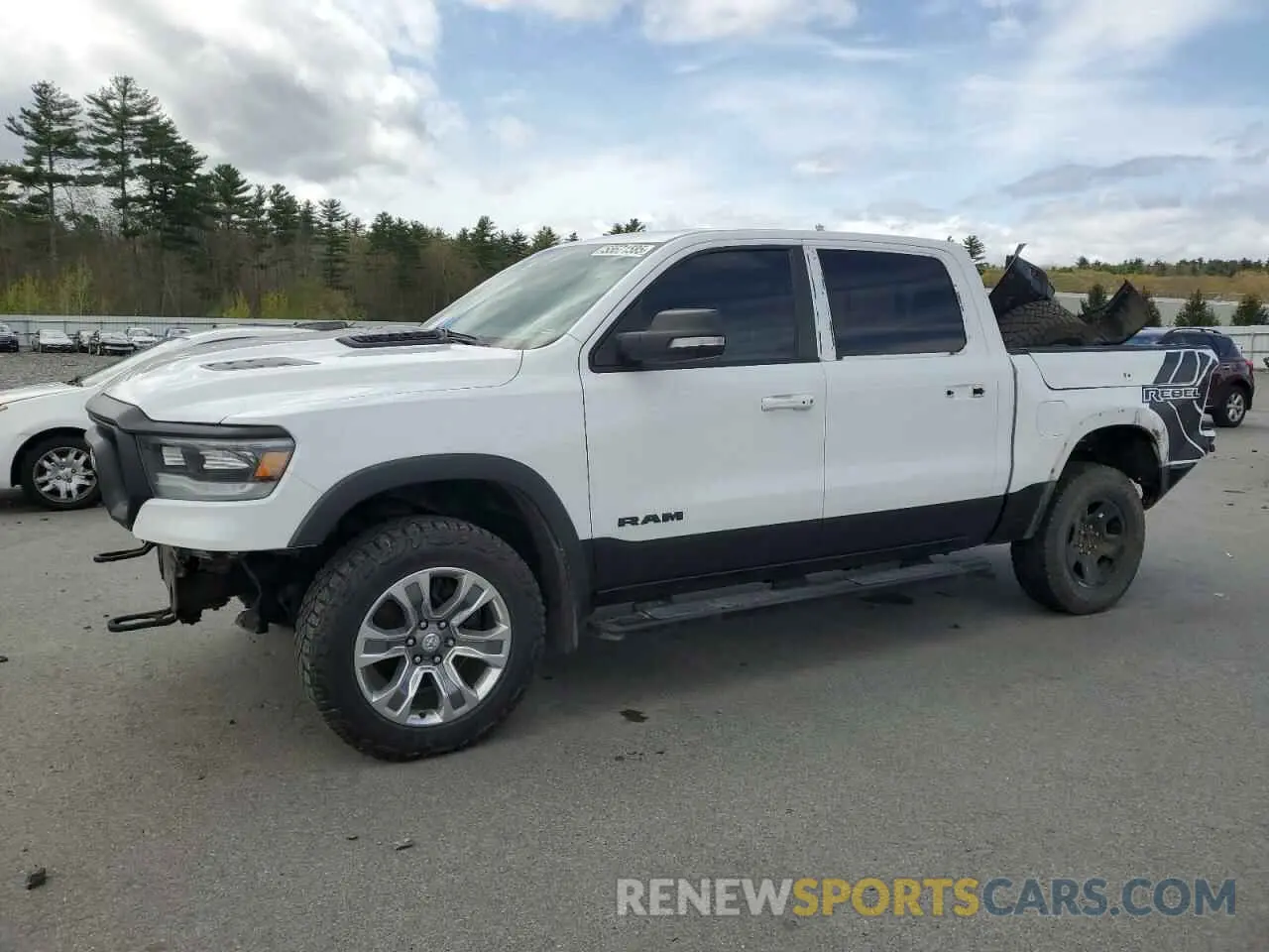 1 Photograph of a damaged car 1C6SRFLM1LN230872 RAM 1500 2020
