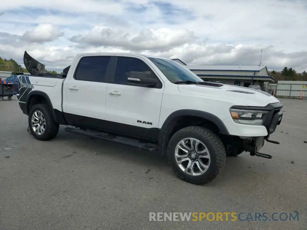 4 Photograph of a damaged car 1C6SRFLM1LN230872 RAM 1500 2020