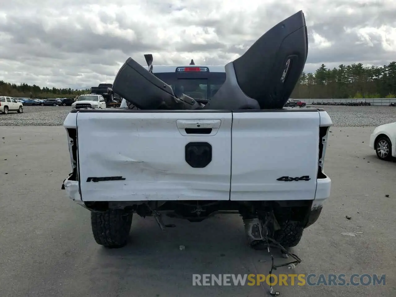 6 Photograph of a damaged car 1C6SRFLM1LN230872 RAM 1500 2020