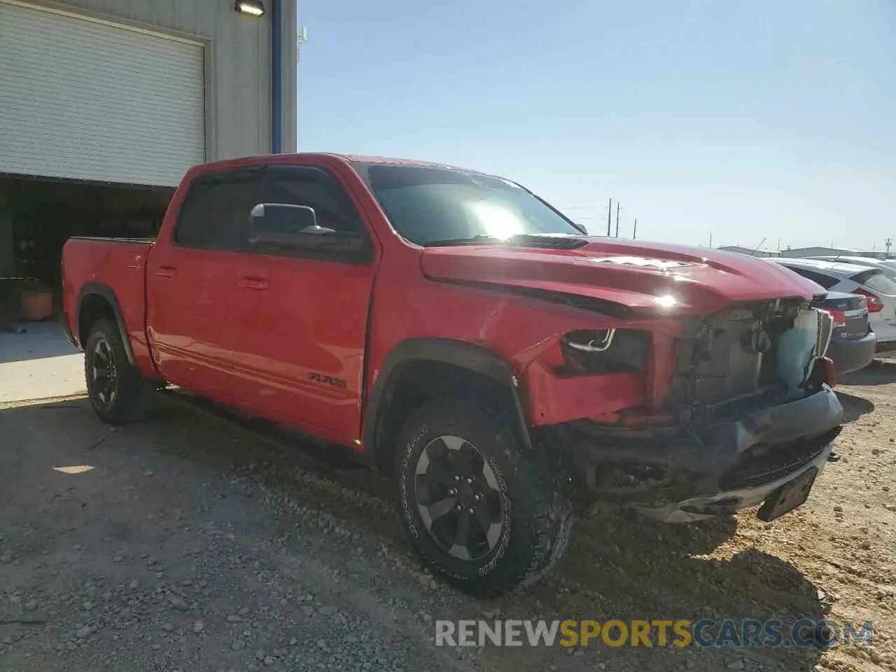 4 Photograph of a damaged car 1C6SRFLM9LN247323 RAM 1500 2020
