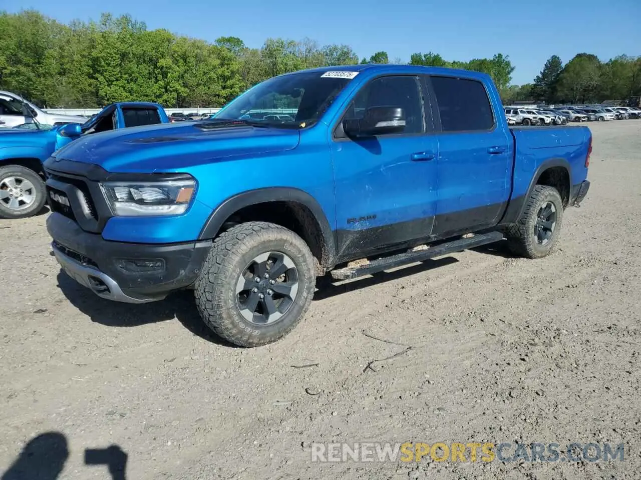 1 Photograph of a damaged car 1C6SRFLM9LN359457 RAM 1500 2020