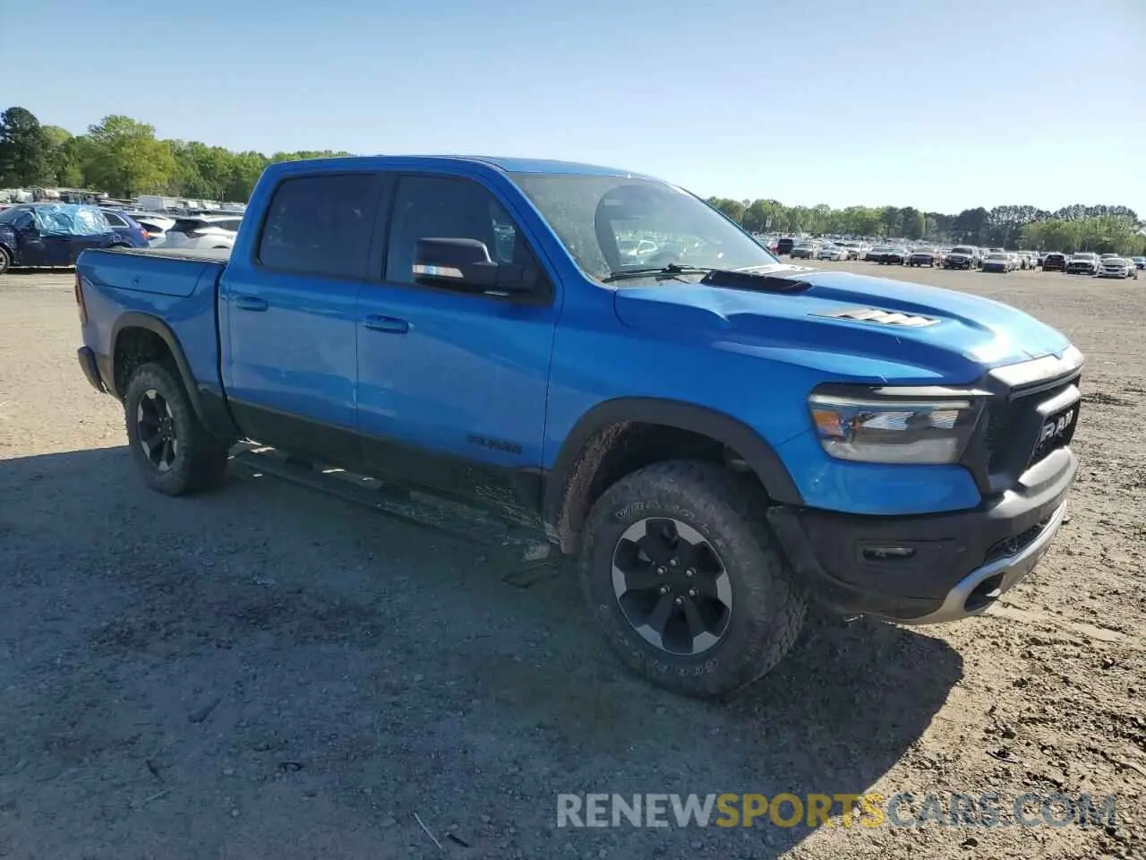 4 Photograph of a damaged car 1C6SRFLM9LN359457 RAM 1500 2020