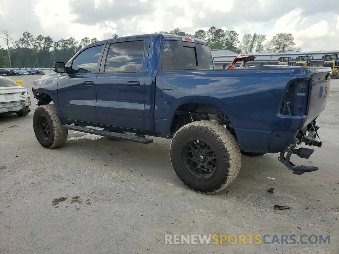 2 Photograph of a damaged car 1C6SRFLT0LN112884 RAM 1500 2020