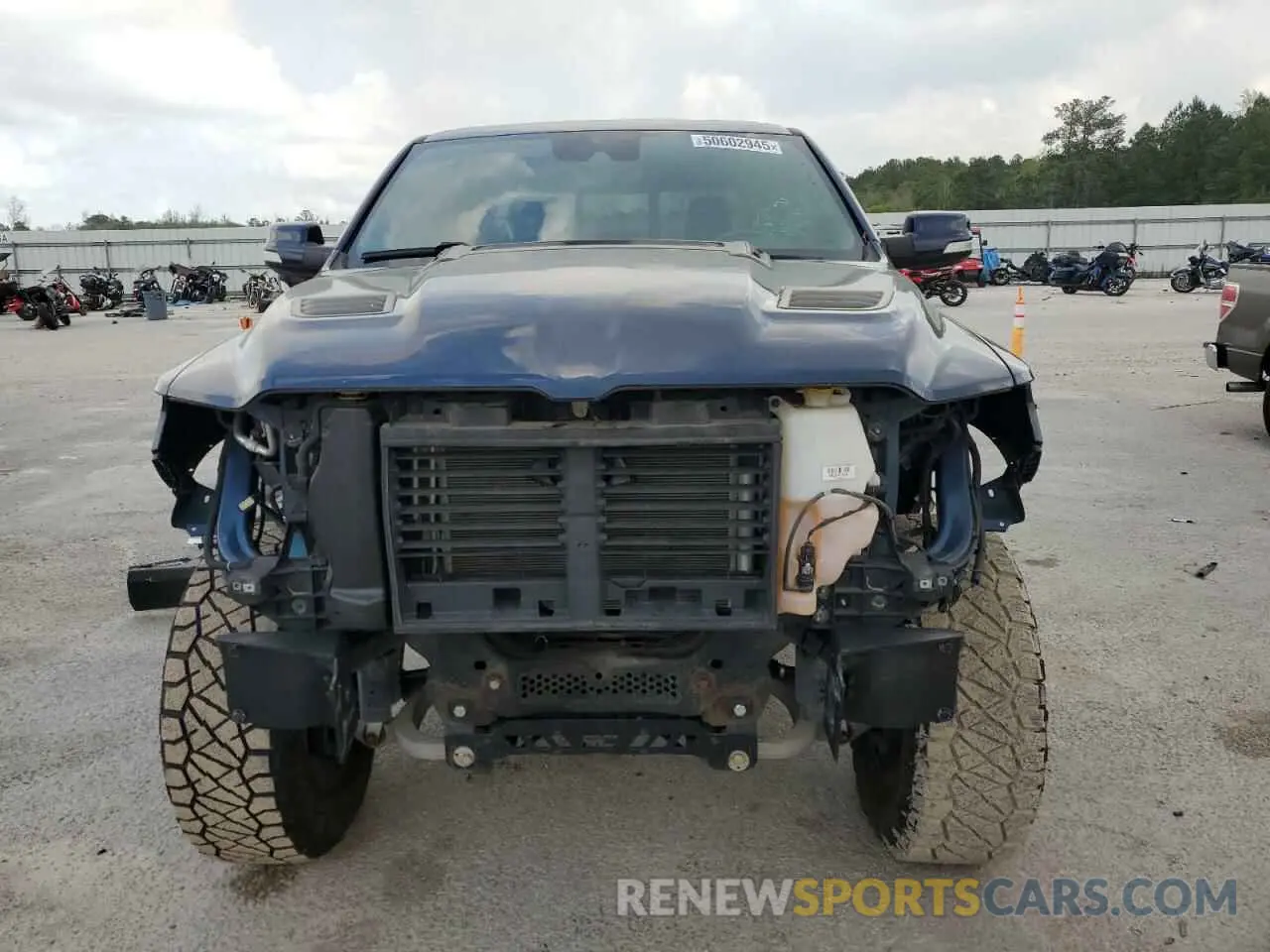 5 Photograph of a damaged car 1C6SRFLT0LN112884 RAM 1500 2020