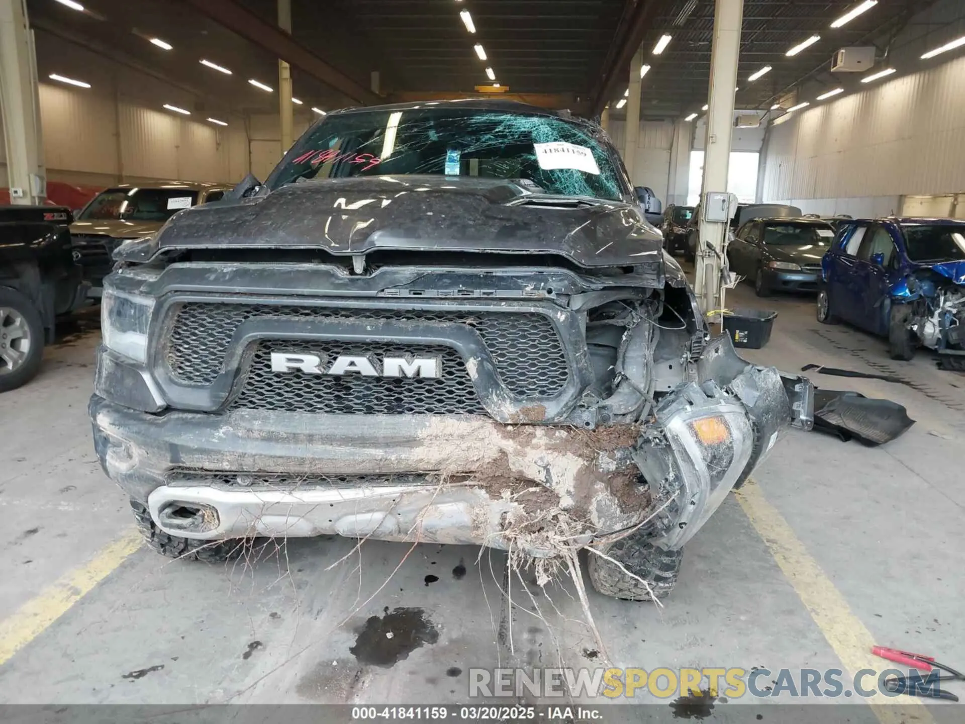 12 Photograph of a damaged car 1C6SRFLT0LN162491 RAM 1500 2020