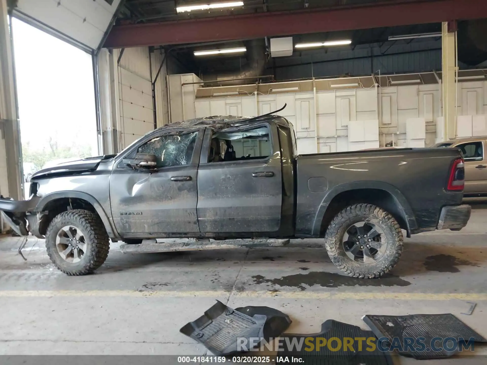 15 Photograph of a damaged car 1C6SRFLT0LN162491 RAM 1500 2020