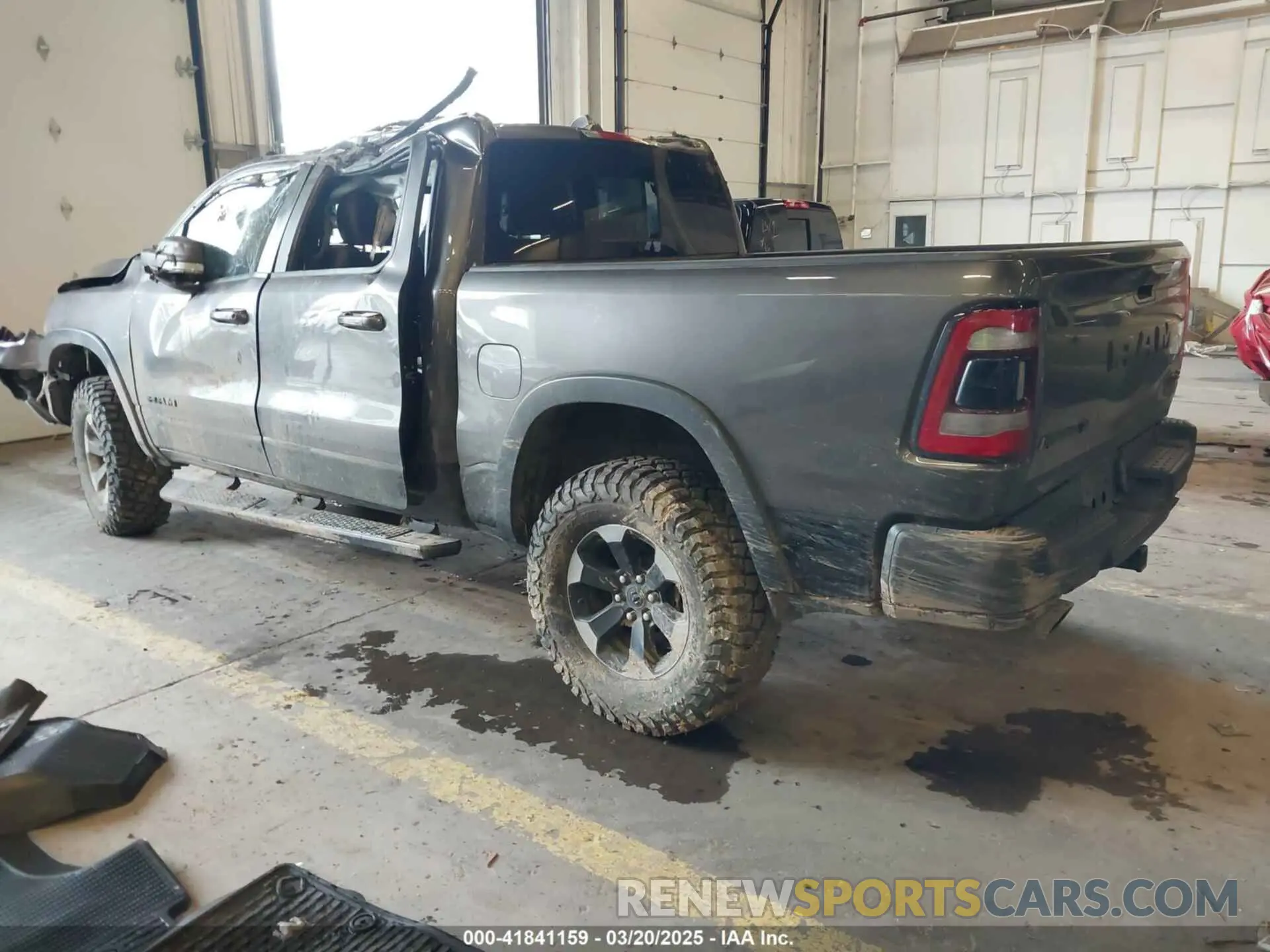 3 Photograph of a damaged car 1C6SRFLT0LN162491 RAM 1500 2020