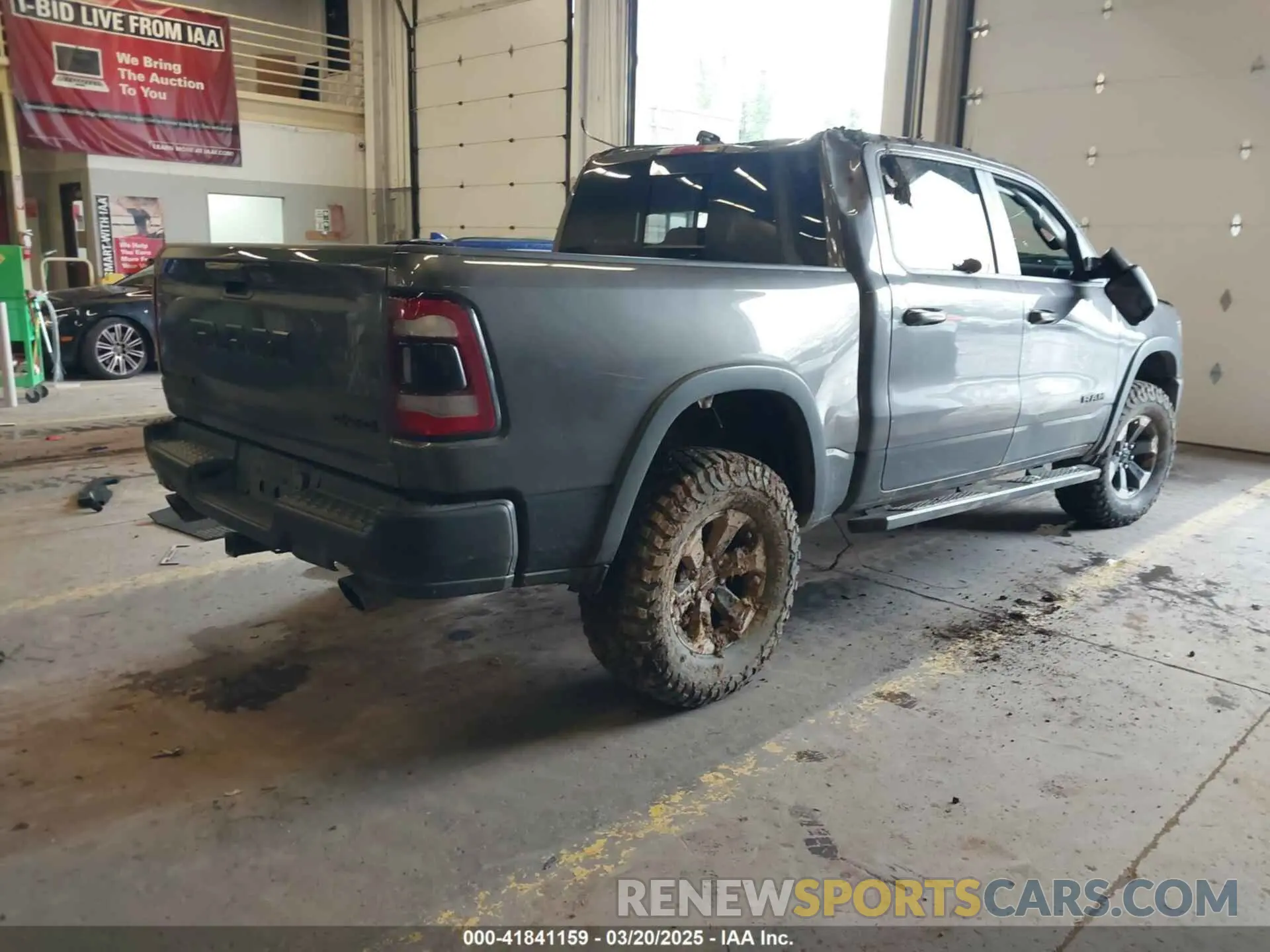 4 Photograph of a damaged car 1C6SRFLT0LN162491 RAM 1500 2020