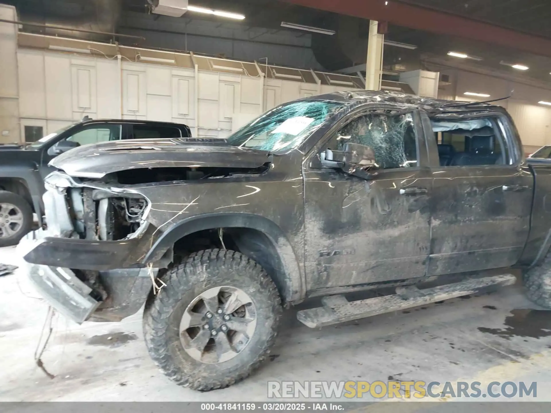 6 Photograph of a damaged car 1C6SRFLT0LN162491 RAM 1500 2020