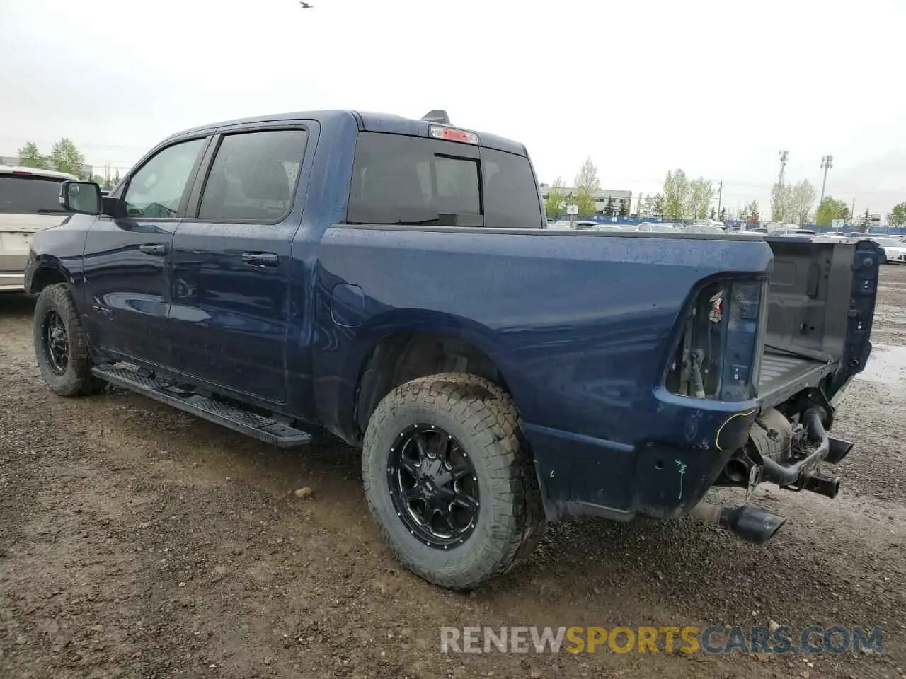 2 Photograph of a damaged car 1C6SRFLT0LN220681 RAM 1500 2020