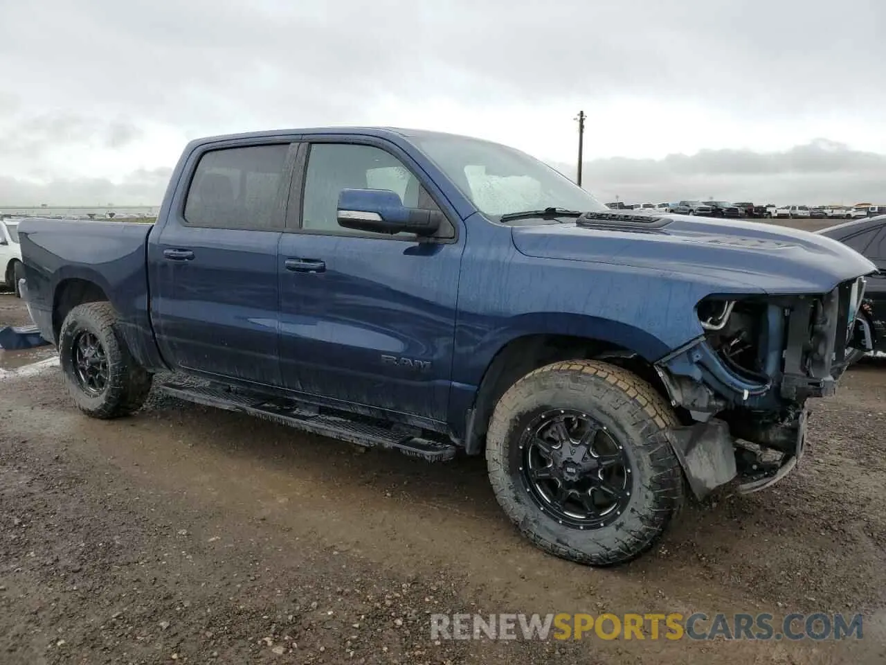 4 Photograph of a damaged car 1C6SRFLT0LN220681 RAM 1500 2020