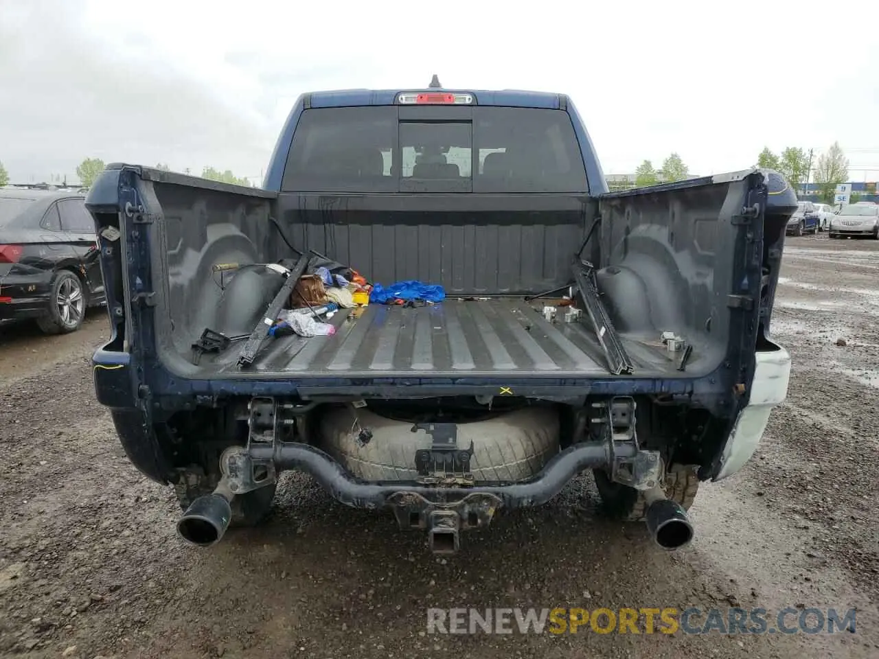 6 Photograph of a damaged car 1C6SRFLT0LN220681 RAM 1500 2020