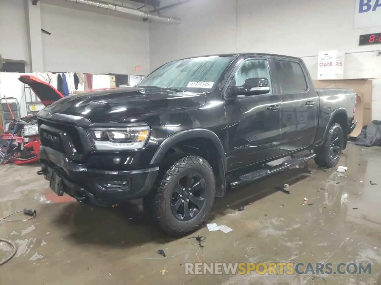 1 Photograph of a damaged car 1C6SRFLT0LN293467 RAM 1500 2020