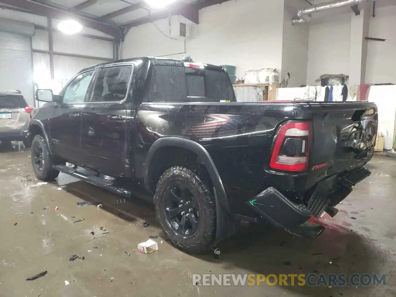 2 Photograph of a damaged car 1C6SRFLT0LN293467 RAM 1500 2020