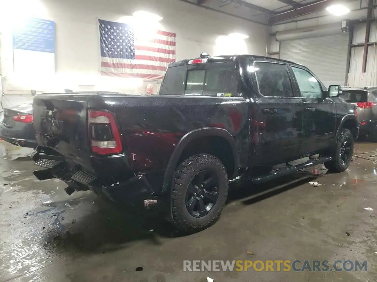 3 Photograph of a damaged car 1C6SRFLT0LN293467 RAM 1500 2020