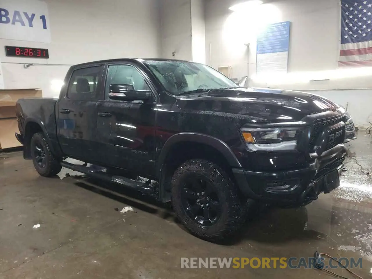 4 Photograph of a damaged car 1C6SRFLT0LN293467 RAM 1500 2020